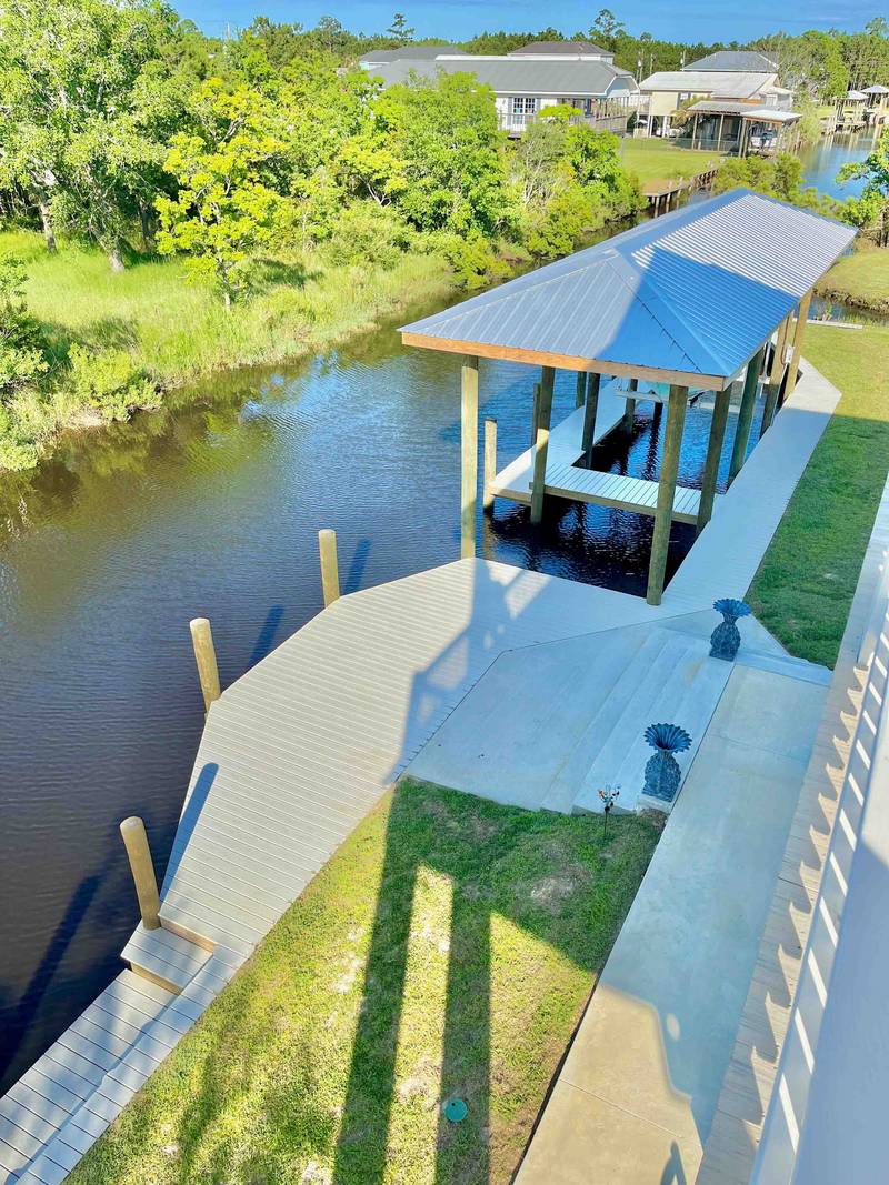 Boathouse and walkway on a canal, seen from above