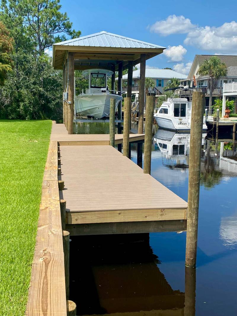 Boathouse at the end of a dock walkway
